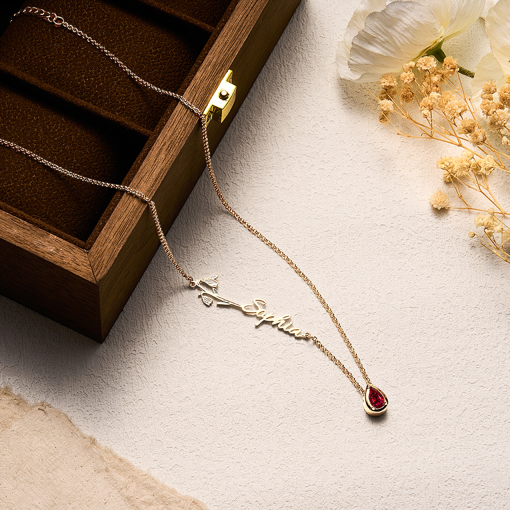 Colar personalizado com flor de nascimento, pedra e nome. Uma joia elegante e cheia de significado, ideal para oferecer em ocasiões especiais. Prendas Originais.