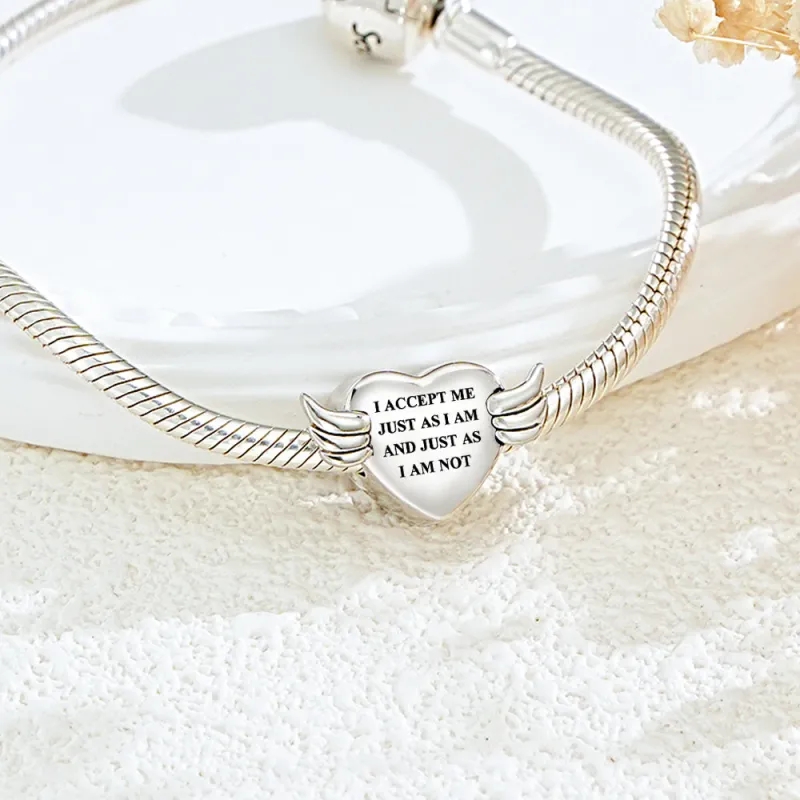 Crie uma pulseira personalizada com foto e texto, com coração e asas de anjo. Uma prenda original e emotiva para Dia da Mãe, Namorados e aniversários.